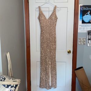 Blush-pink sequined gown with slit-leg style